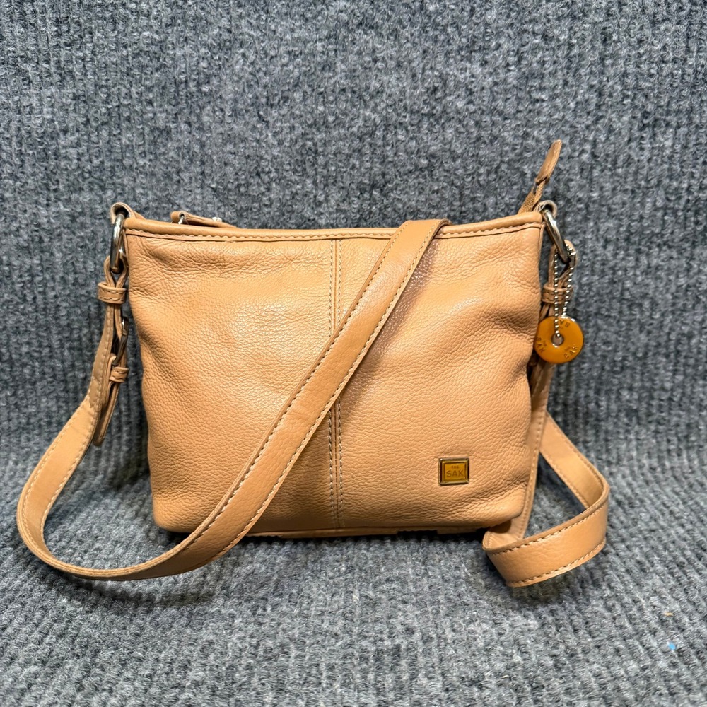 The Sak Tan Pebbled Shoulder Bag Zip Top Floral Lined Pockets Crossbody Strap